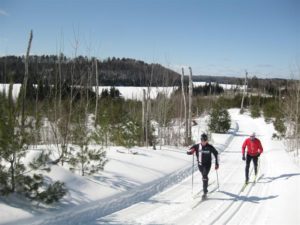 Jason Dalebroux and John Layton stride the hills around Flour Lake.