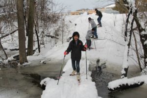 Youa Yang made the treacherous bridge crossing  to the ski trails.