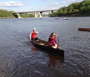 Loppet Foundation and MCA members paddle during a Rookies session on the Mississippi River.